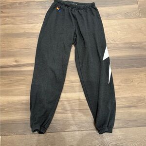 Aviator Nation Black Joggers with White Lightening Bolt